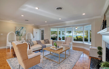 Tampa living room with beautiful bay views designed by Home Frosting