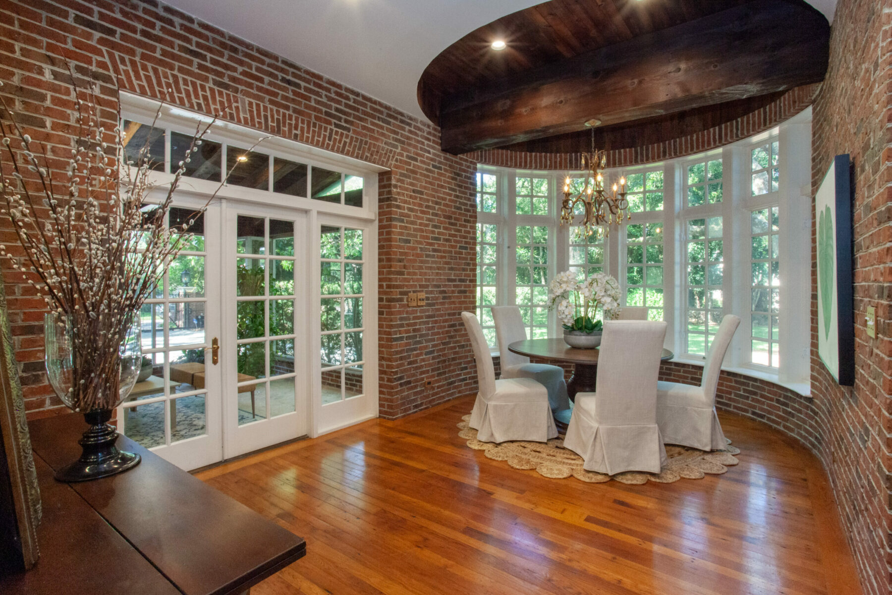 Dining room with an old-world charm designed by Tampa's Home Frosting