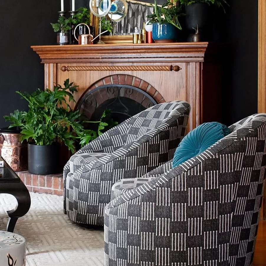 two checkered chairs in a living room setting
