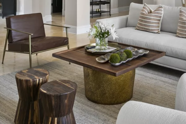 coffee table in the middle of a living room setting