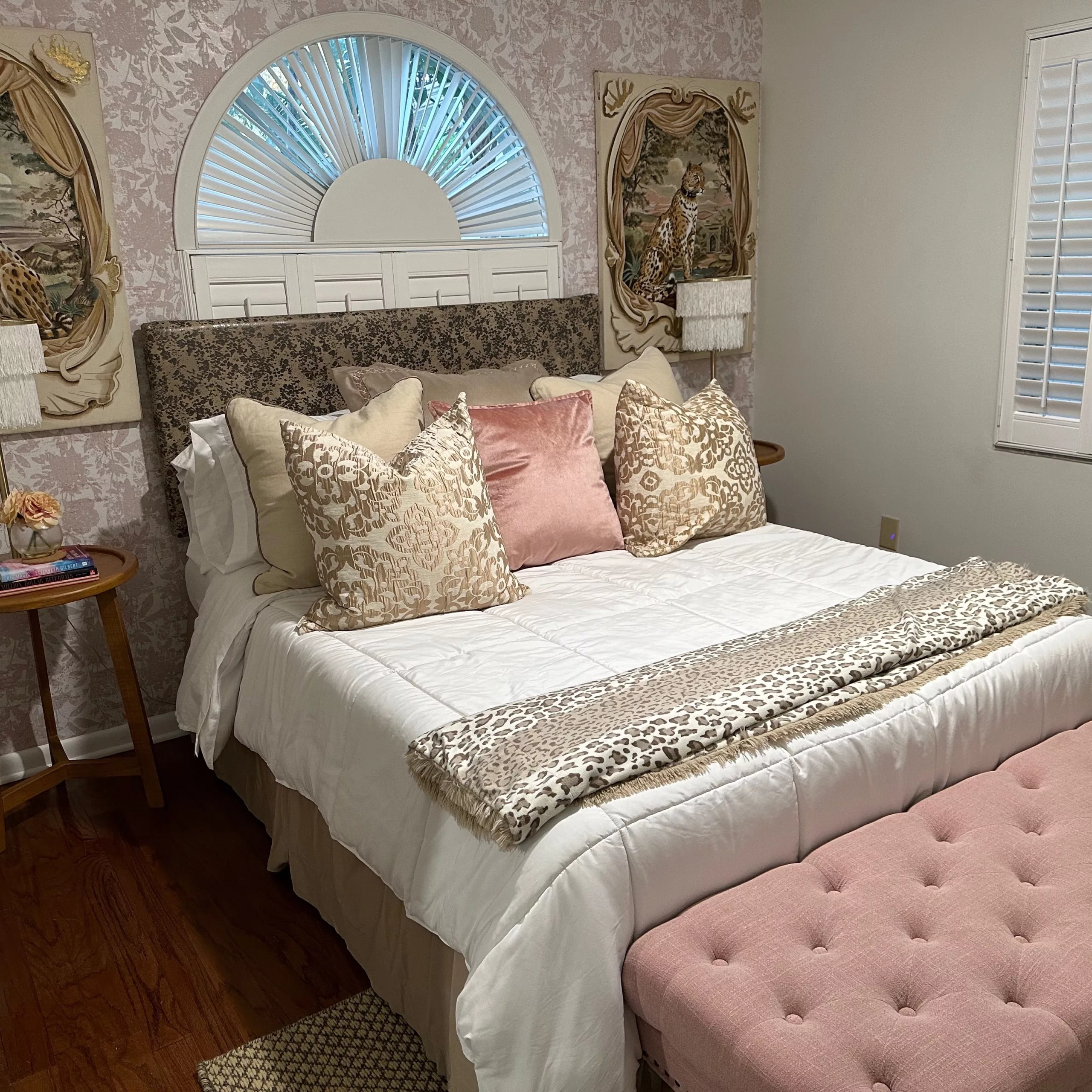 bedroom setting with gold and pink tones